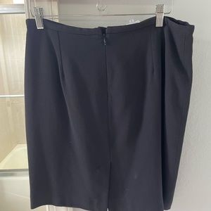 Armani collezioni. Size 12. Waist 33". Length 21".  Lined.